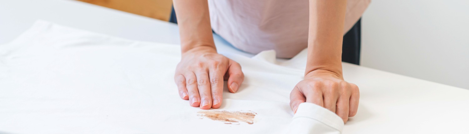 vlekken uit kleding verwijderen